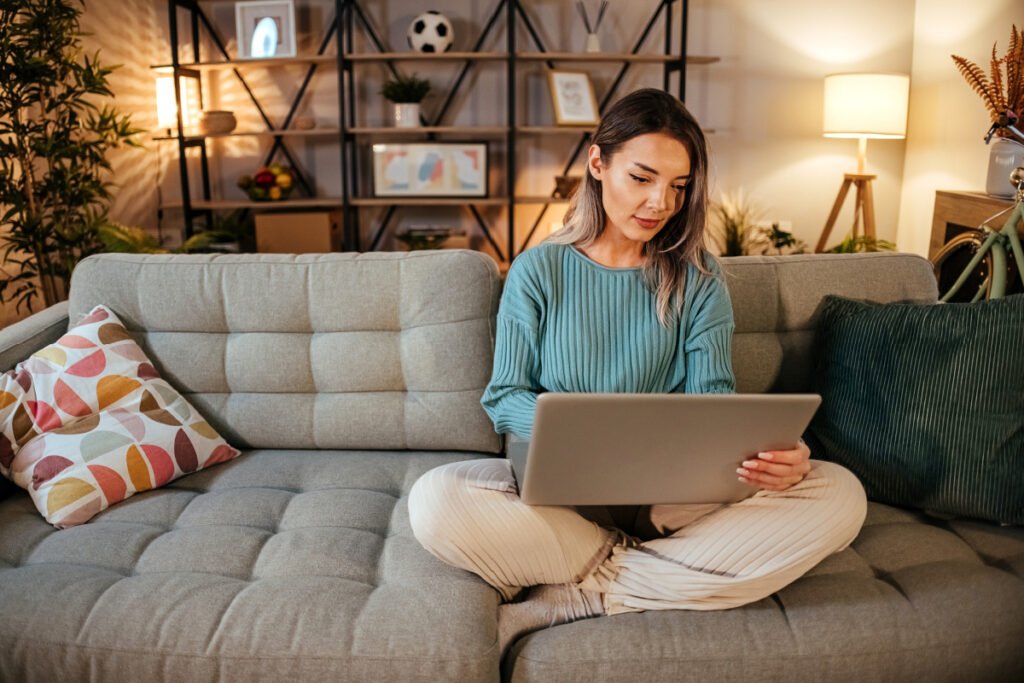 Woman researching breast implants and plastic surgeons who specialize in breast augmentation procedures