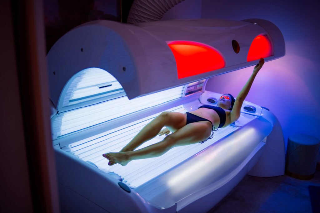 Can a tanning bed help improve certain skin concerns?